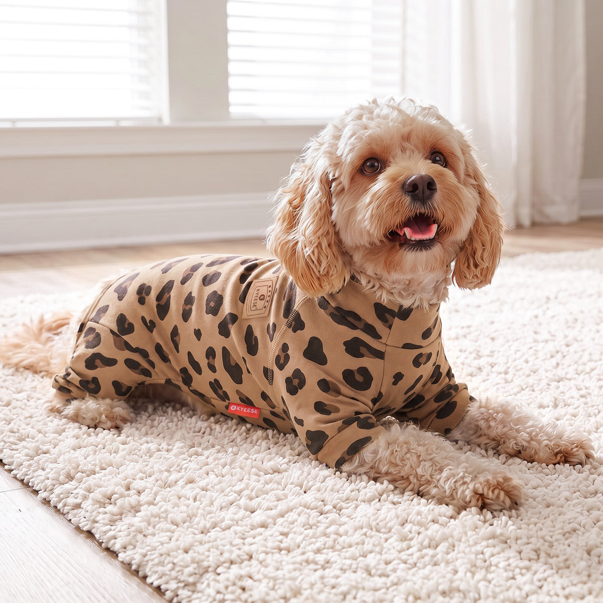 Khaki Leopard Turtleneck Dog Onesie Pajamas, small dog resting on a rug in the pajamas