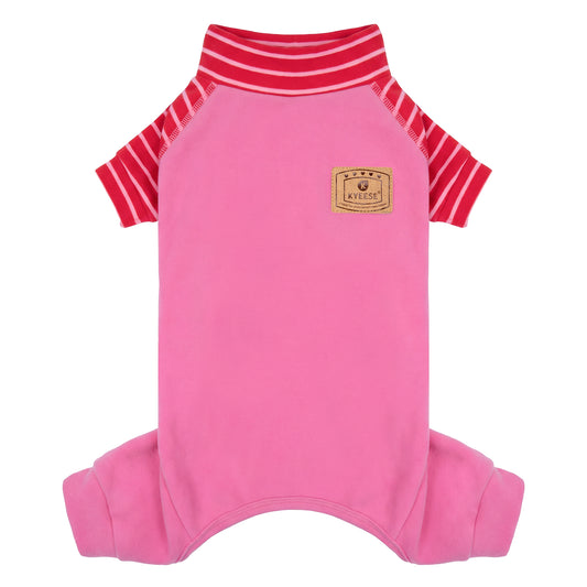 Pink dog onesie pajamas with red striped raglan sleeves and high collar, laid flat