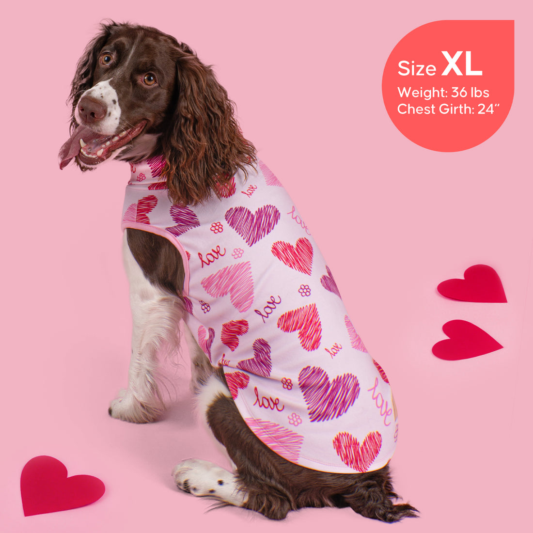 Sleeveless dog shirt in white with pink hearts and "love" text, side view
