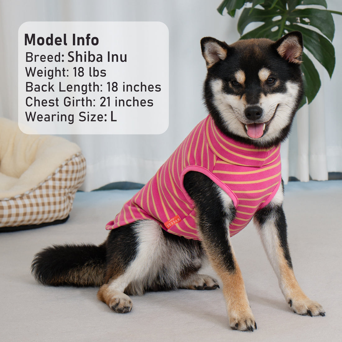 Pink-and-yellow striped sleeveless dog turtleneck sweater