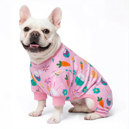 Pink dog onesie pajama with pastel Easter bunny, carrots, eggs and ribbed cuffs