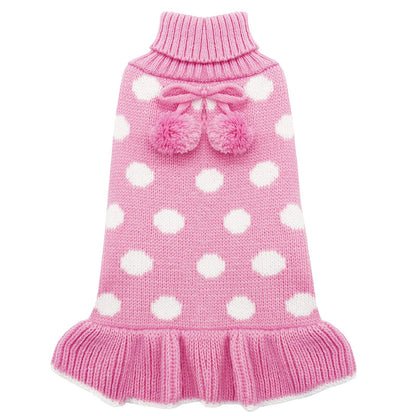 Pink dog sweater dress with white polka dots, bow and pom pom accents, ribbed turtleneck.