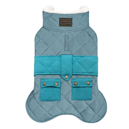Quilted dog coat with pocket, teal front panel with four pocket sections and fleece lining.