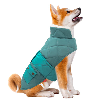 Quilted dog coat with pocket, teal outer with white fleece-lined collar and leg openings.