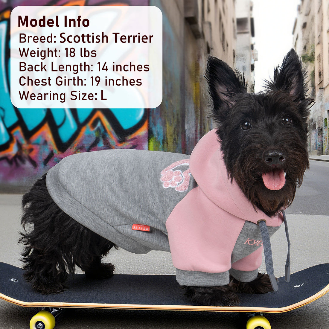 Winter dog hoodie with pink hood and gray body, paw patch and front leash hole