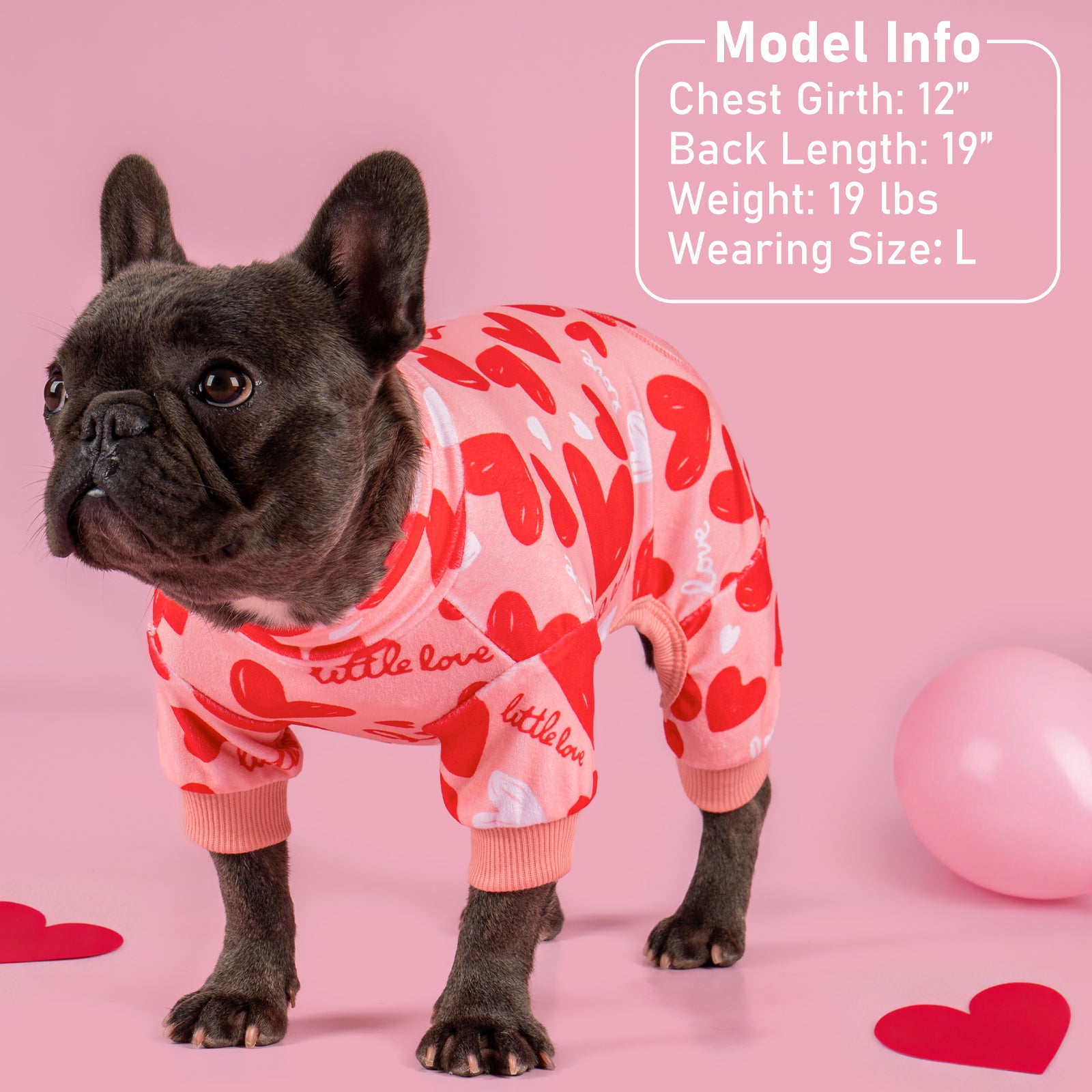 Heart-pattern dog onesie pajama with pink ribbed collar and sleeve cuffs
