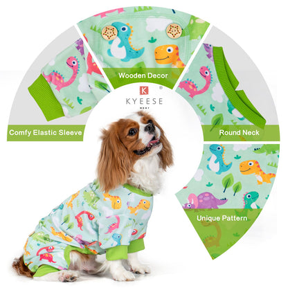 Dinosaur-print dog onesie pajamas in light aqua with green ribbed collar and cuffs