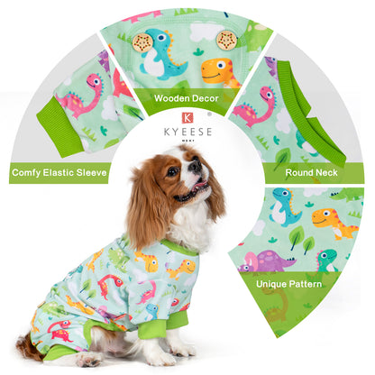 Dinosaur-print dog onesie pajamas in light aqua with green ribbed collar and cuffs