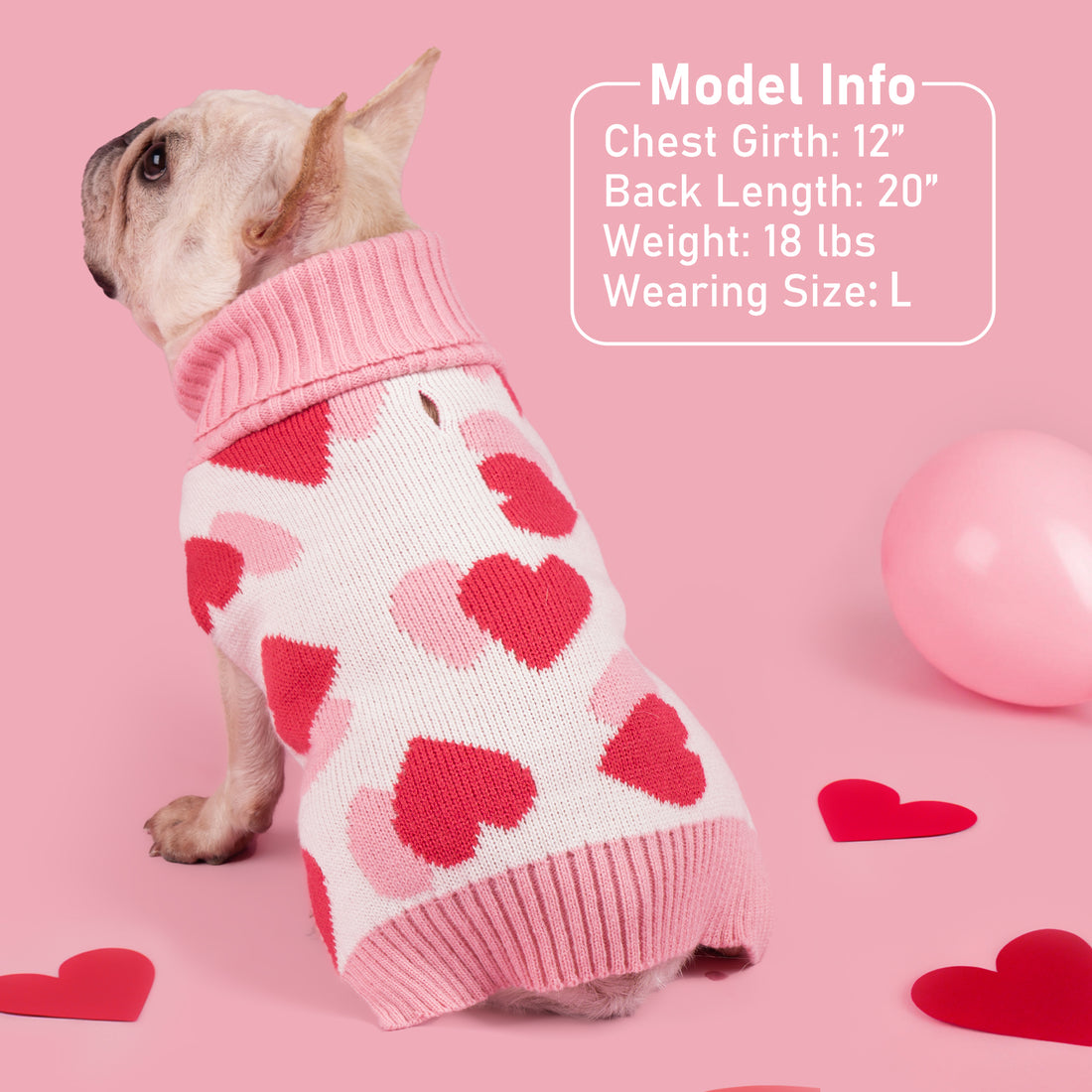 Dog sweater with pink collar and red heart pattern on white knit, ribbed cuffs