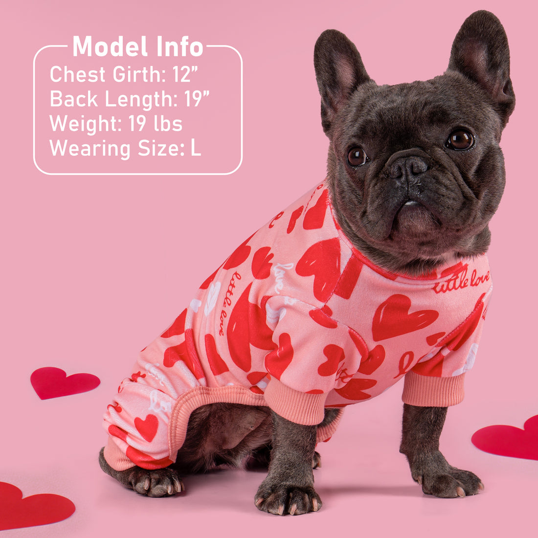 Red-and-white heart dog onesie pajama with pink ribbed neck and leg openings