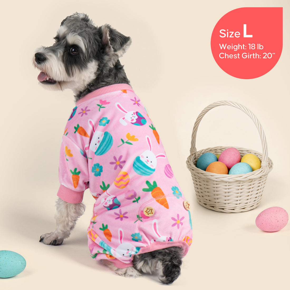 Pink Easter print dog onesie pajama with long sleeves and ribbed cuffs, bunny and eggs