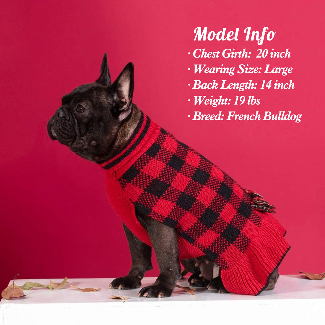 Plaid knit dog sweater dress with red ribbed skirt and heart bow at waist