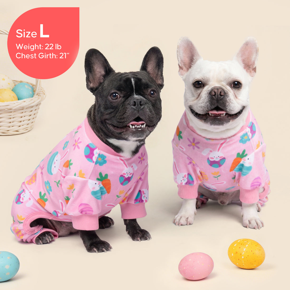 Pink Easter print dog onesie pajama with ribbed cuffs, worn by two dogs