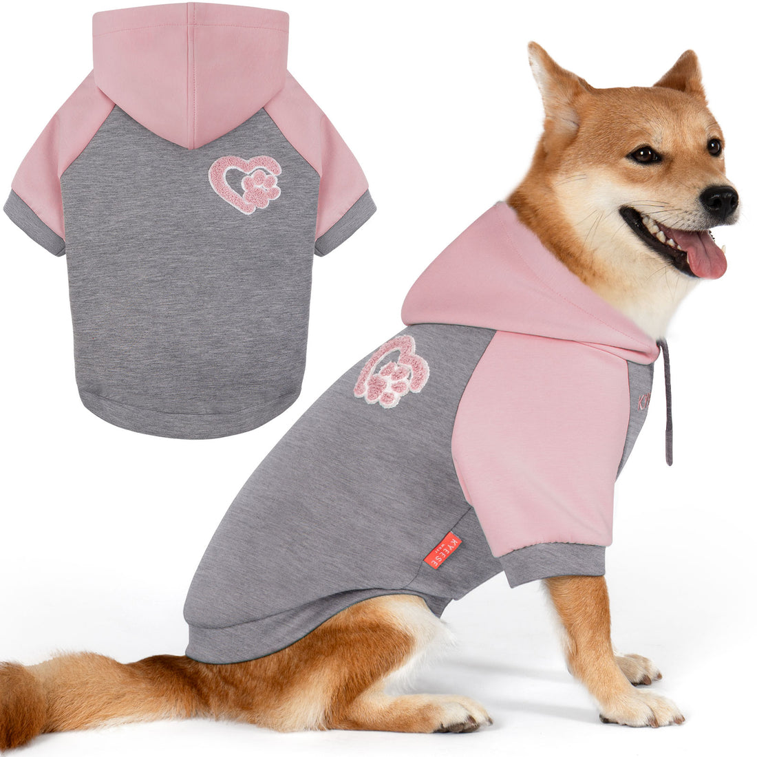 Winter dog hoodie with pink hood and gray body, paw patch and front leash opening