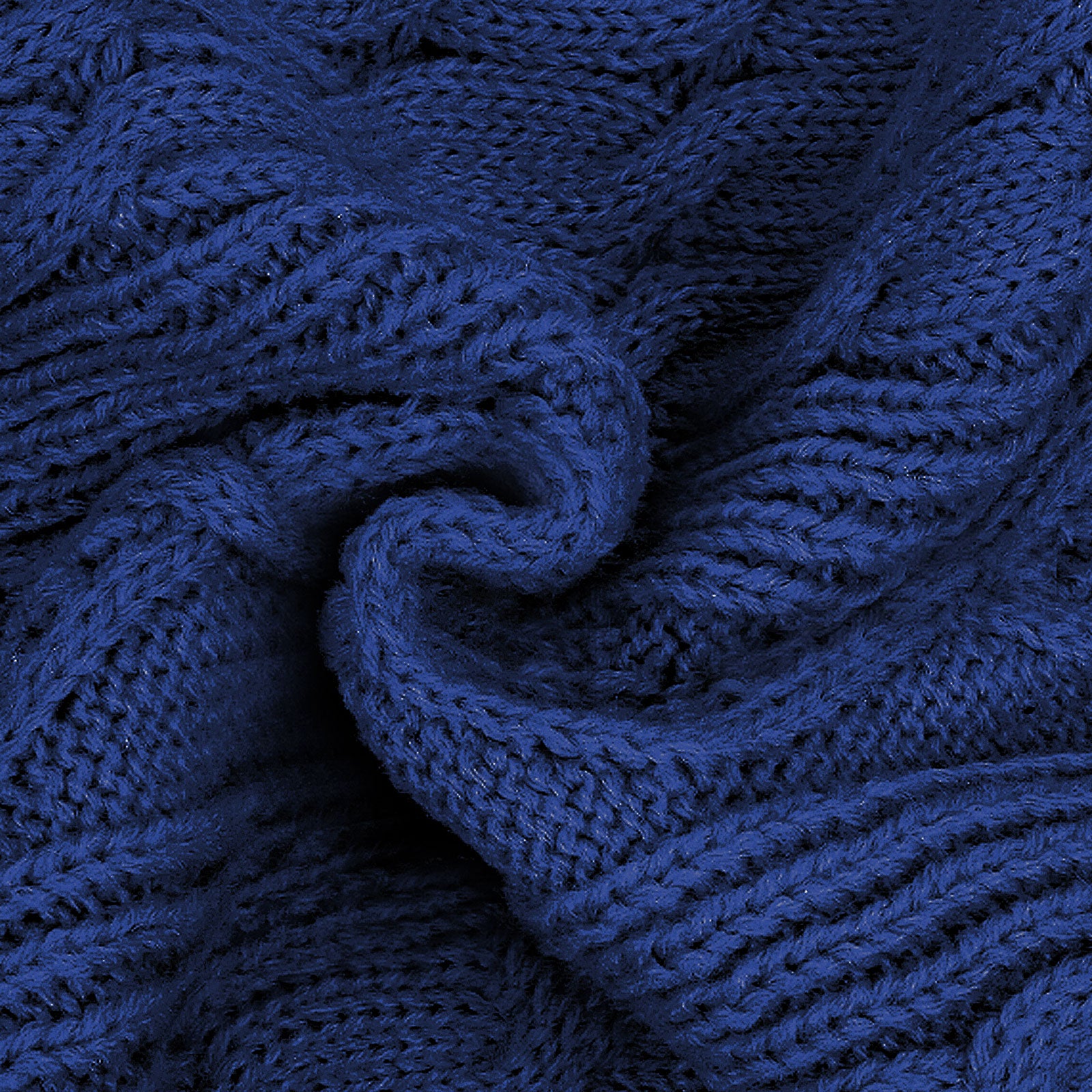 Dark blue knit fabric close-up with cable pattern texture