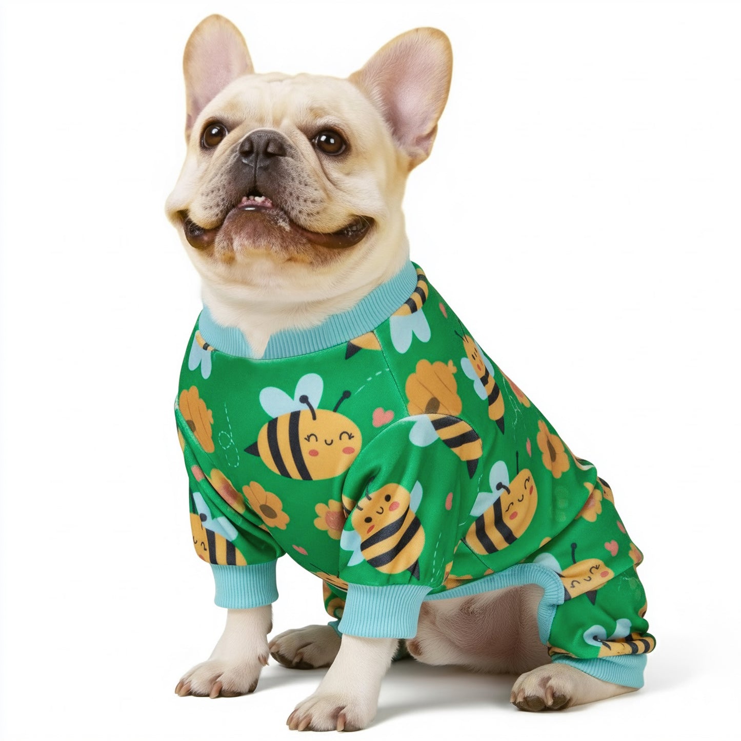 Green dog onesie pajamas with colorful bee print and light blue cuffs, worn front view.