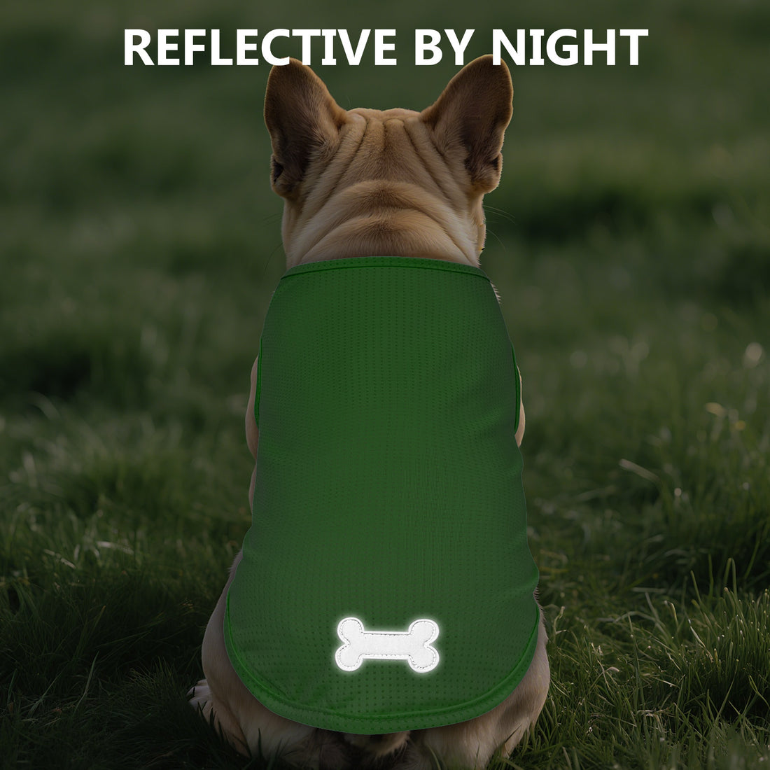 Green mesh dog shirt with reflective bone logo at hem