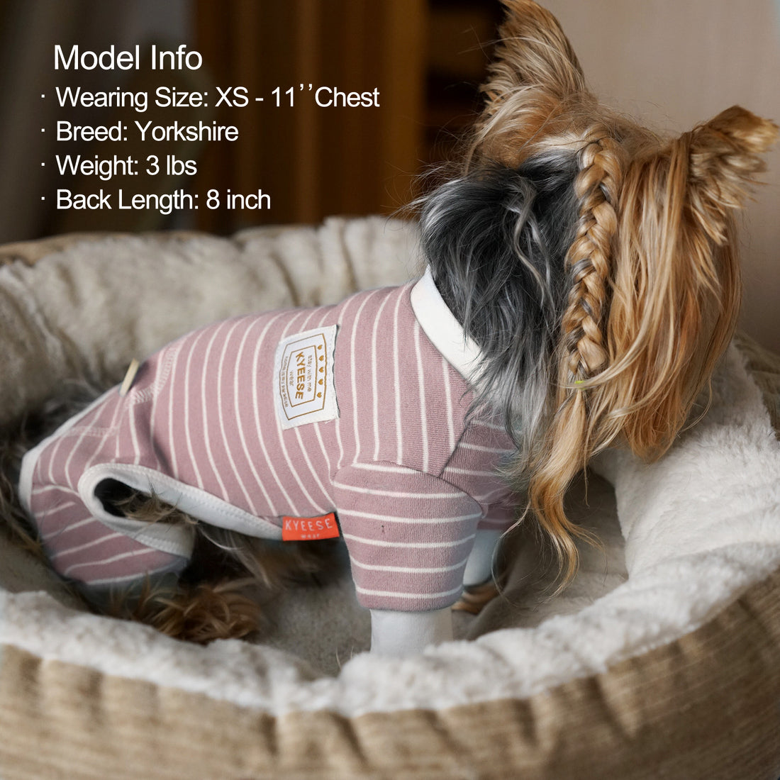 Pink striped dog onesie pajamas with small chest logo patch and soft fit