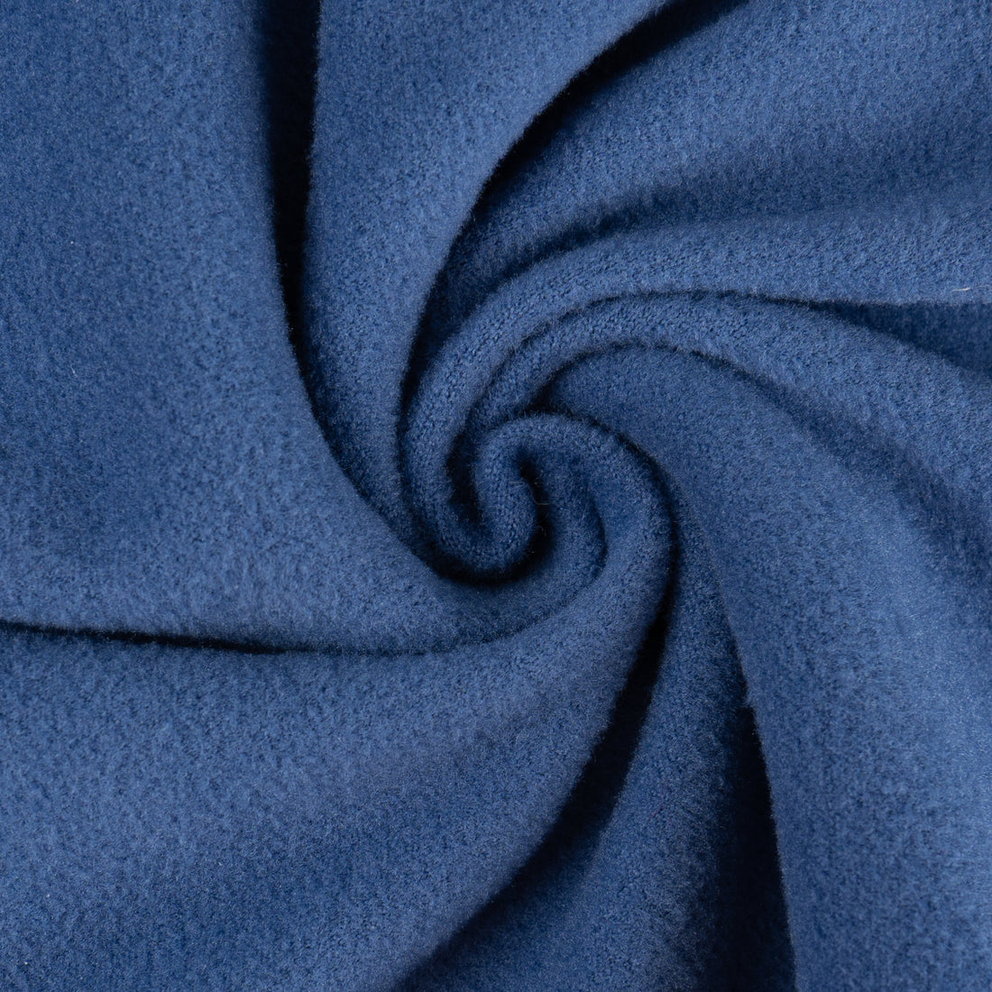 Blue thermal dog pajamas fabric close-up, soft textured weave.