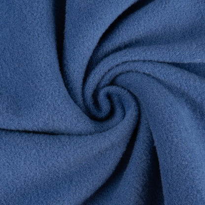 Blue thermal dog pajamas fabric close-up, soft textured weave.