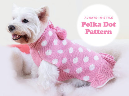 Pink dog sweater dress with white polka dots and pom pom bow detail.