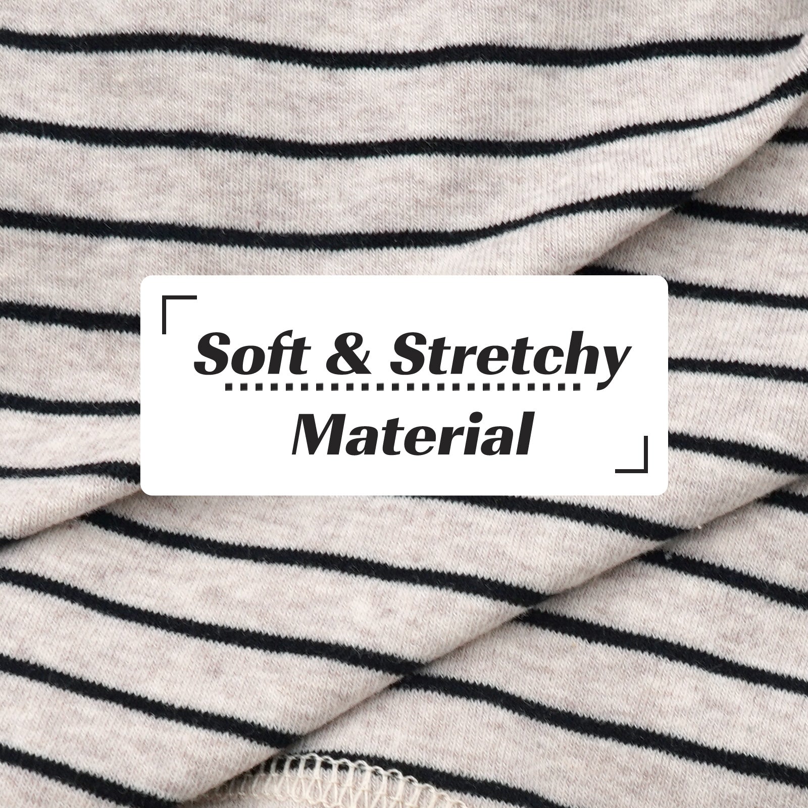 Striped dog onesie fabric close-up, soft knit with black horizontal stripes