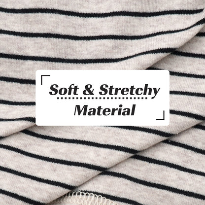 Striped dog onesie fabric close-up, soft knit with black horizontal stripes