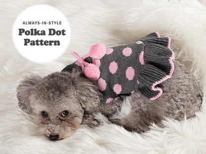 Dark grey dog sweater dress with pink polka dots and pom pom bow detail.