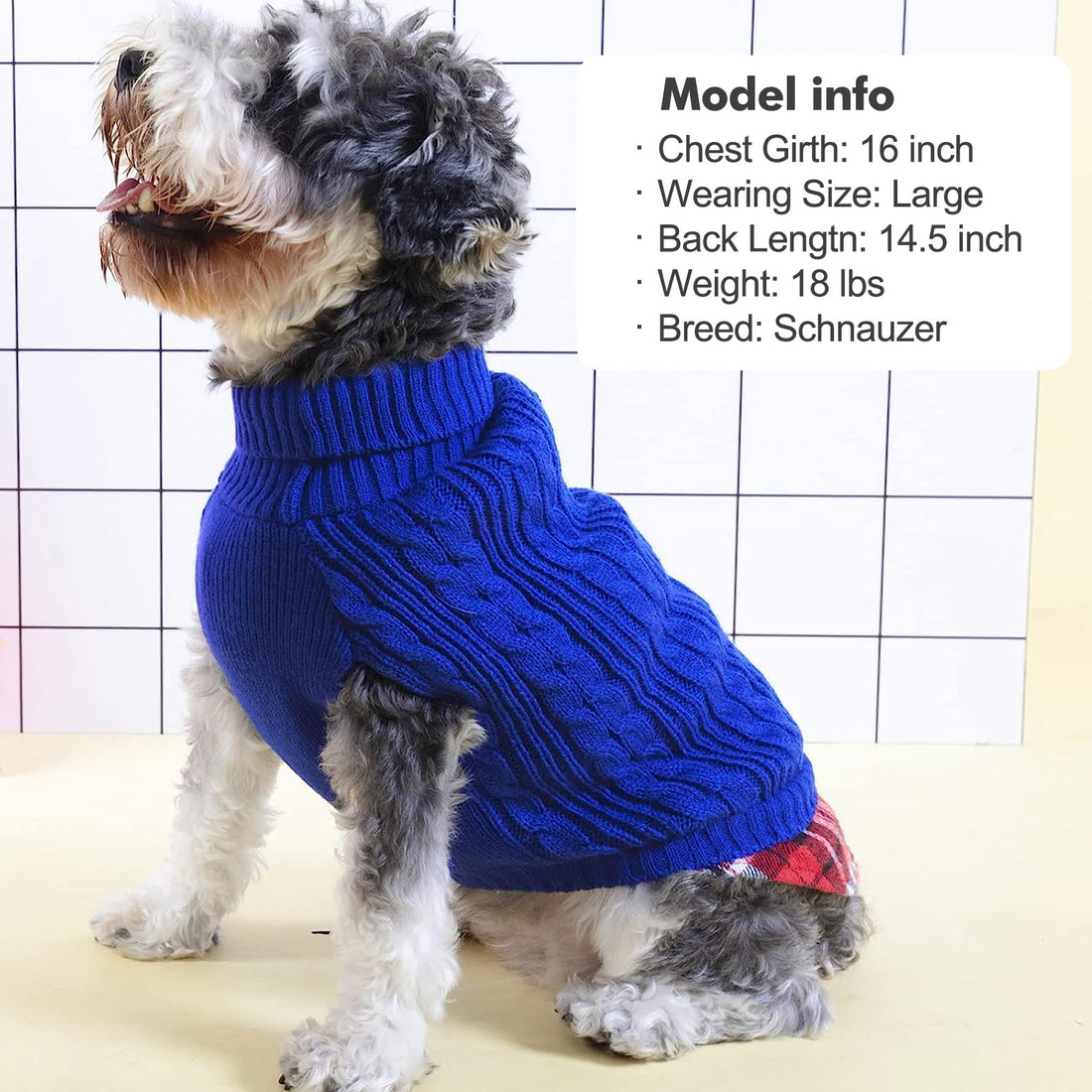 Blue turtleneck dog sweater with cable knit texture and plaid hem panel