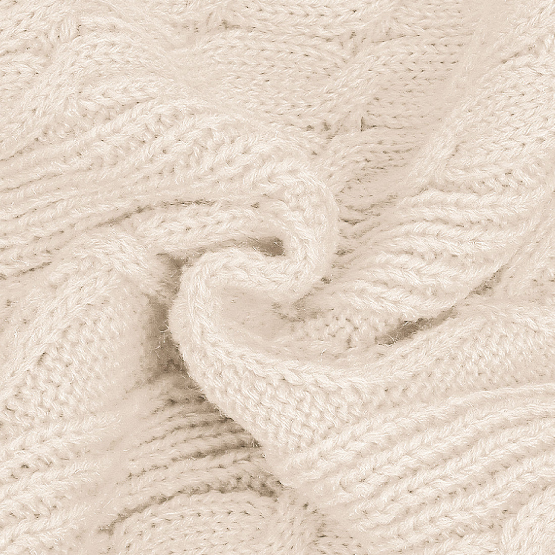 Cream cable knit dog sweater fabric with textured stitch and heart cable pattern