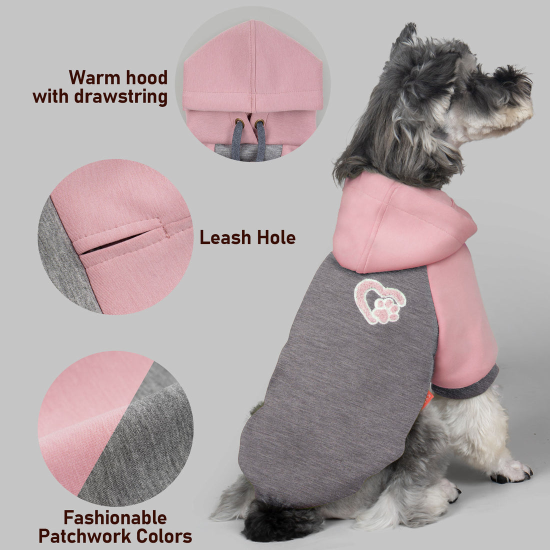 Winter dog hoodie details: pink hood, leash hole opening, paw patch, warm drawstring
