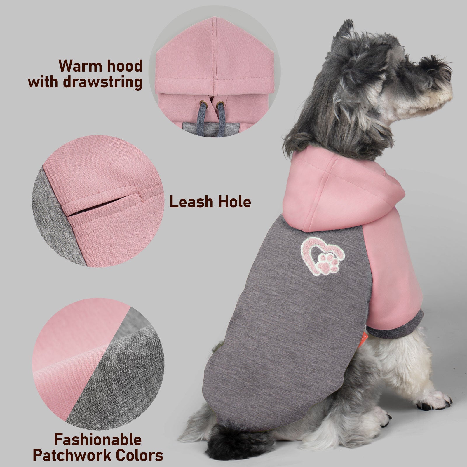 Winter dog hoodie details: pink hood, leash hole opening, paw patch, warm drawstring