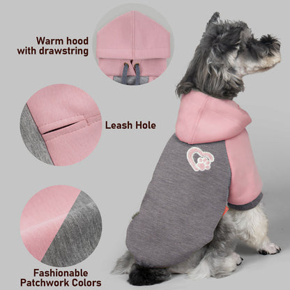 Winter dog hoodie details: pink hood, leash hole opening, paw patch, warm drawstring