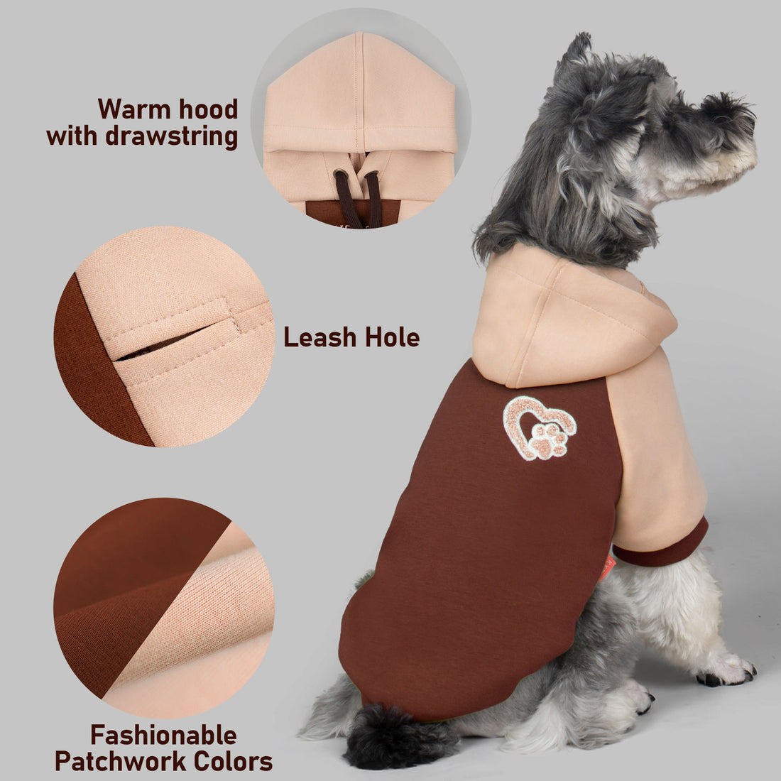 Winter dog hoodie details: pink hood, leash hole, paw patch, warm drawstring
