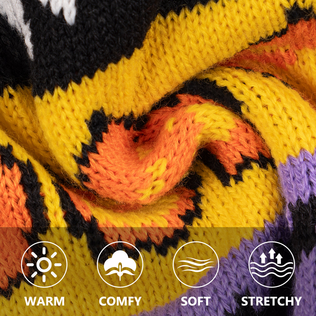 Knitted Halloween dog sweater close-up with orange, yellow, purple, and black motif