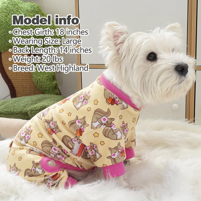 Beige dog onesie pajamas on dog model with pink collar and cartoon animal print