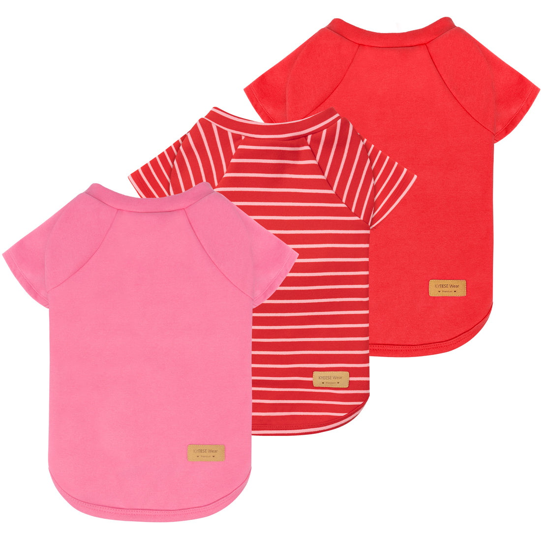 Three dog shirts: pink solid, red solid, and red-and-white striped raglan