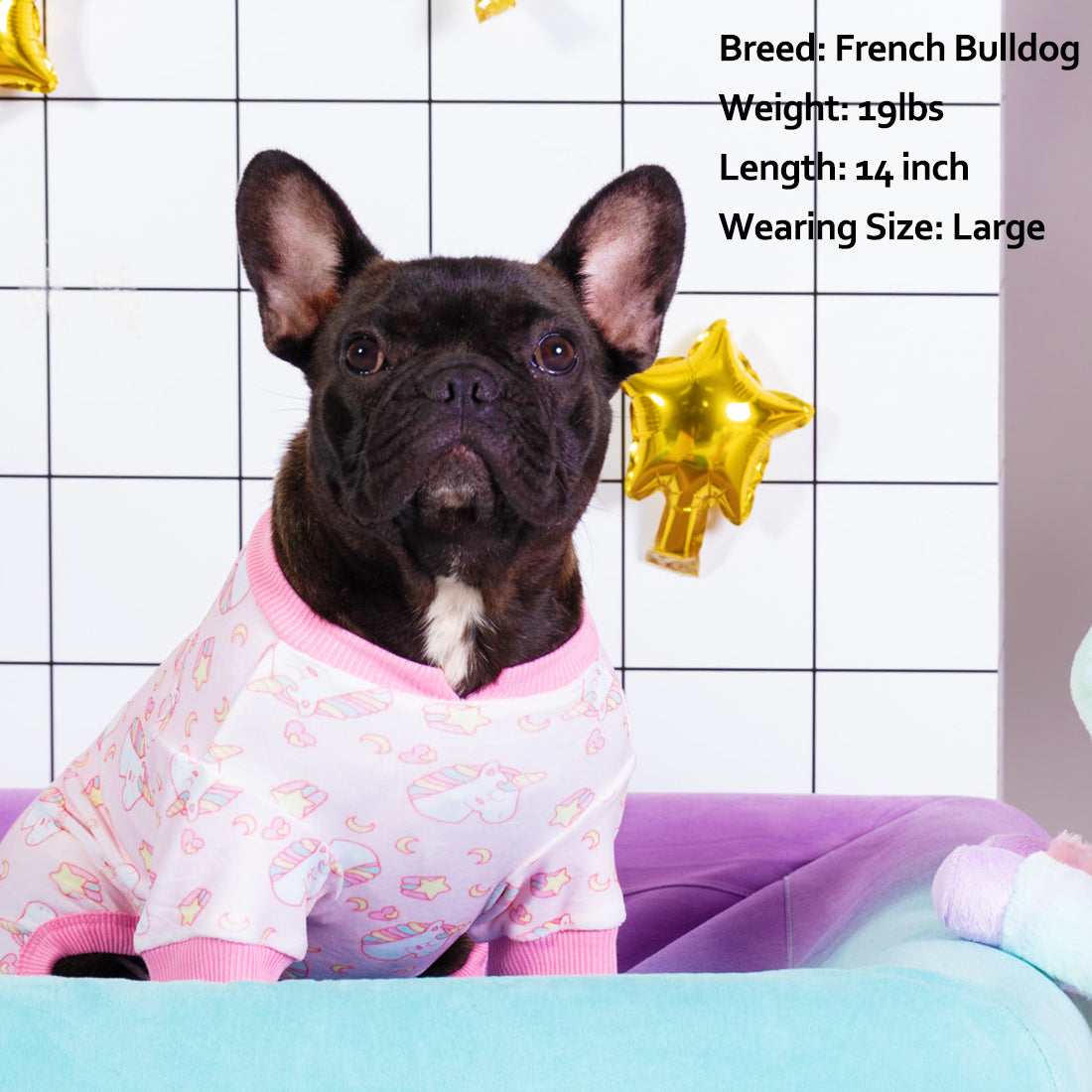 Light pink unicorn dog print dog onesie with ribbed crew neck and striped sleeve cuffs