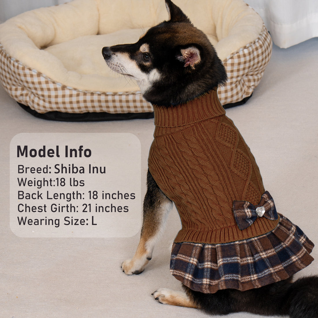 Brown cable knit dog sweater with turtleneck, plaid ruffle hem, and bow