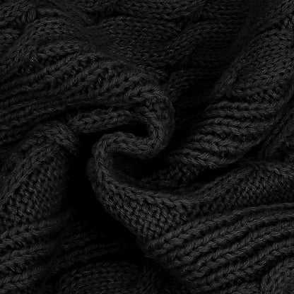 Black cable knit sweater texture with braided stitch detail