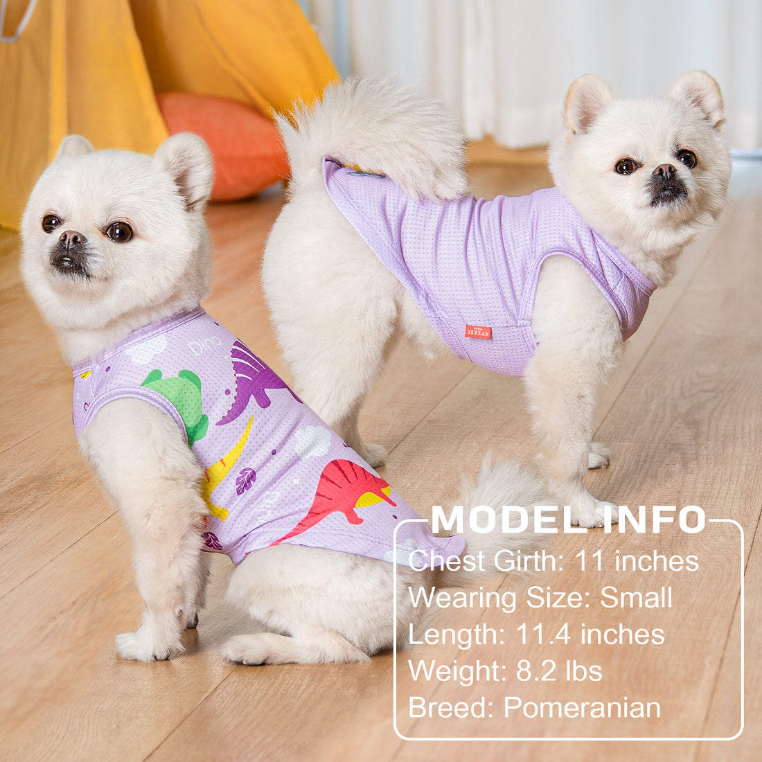 Lilac mesh dog shirt with colorful dinosaur print and gray bone emblem