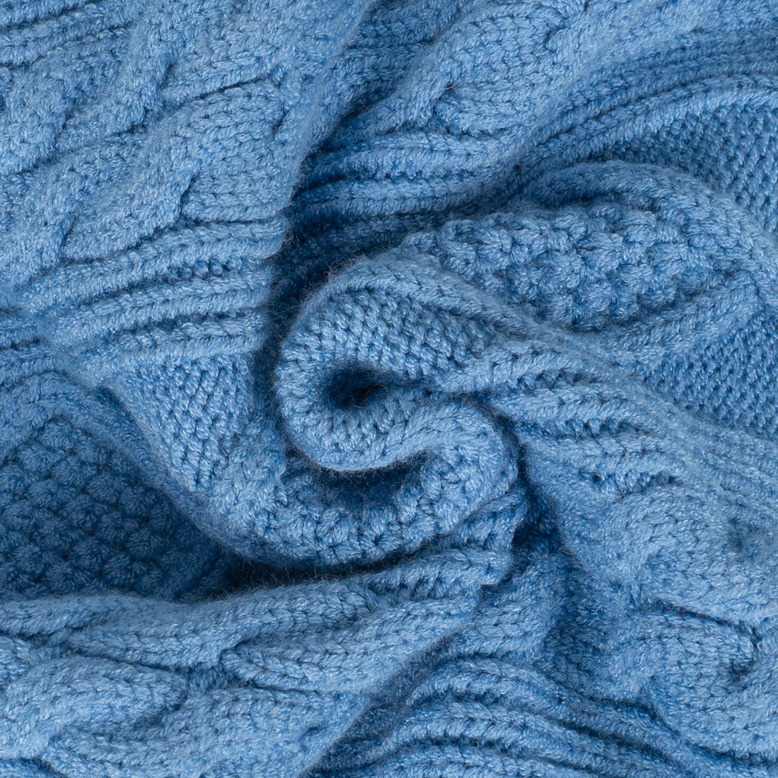 Blue cable knit dog sweater stitch and swirl detail