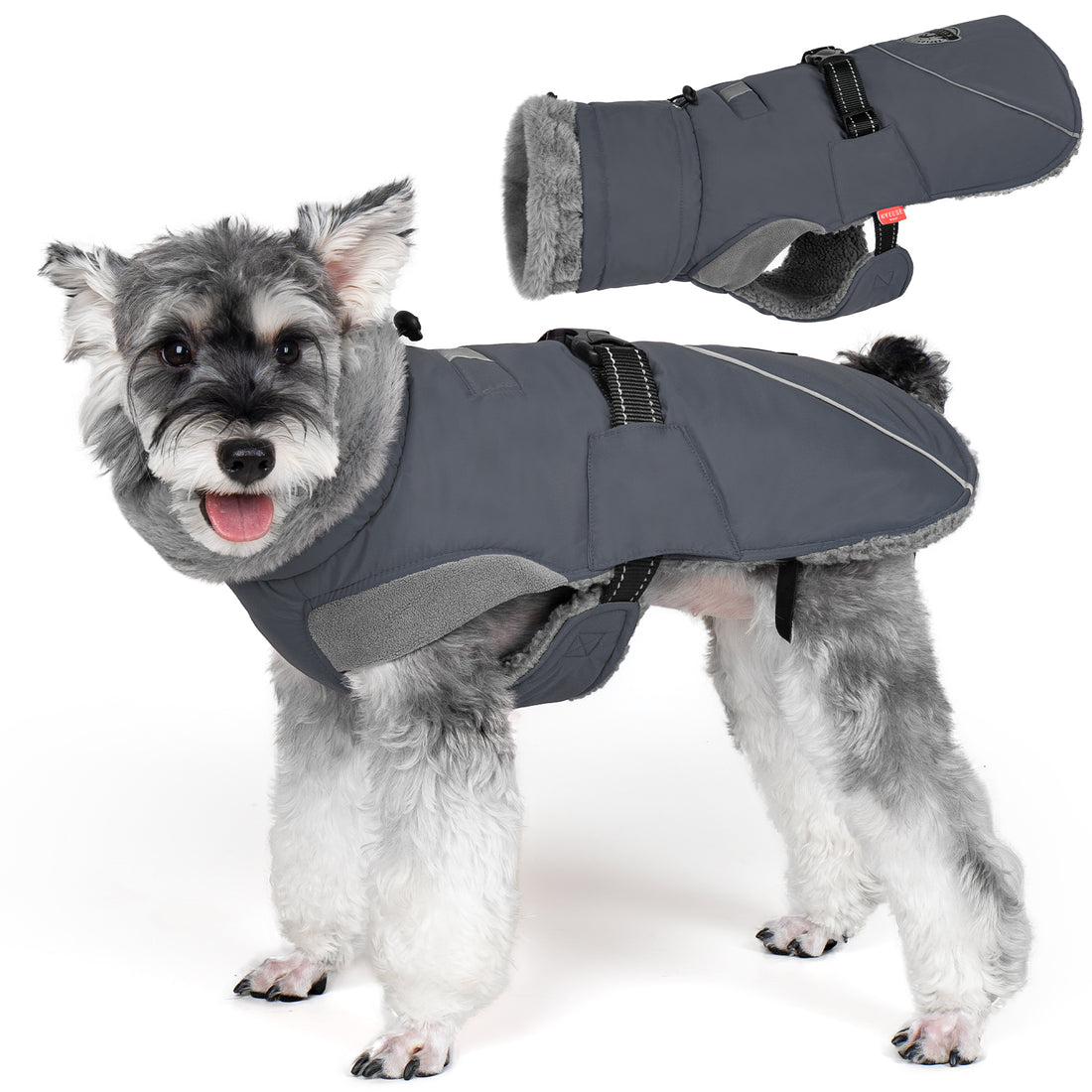 Fleece-lined windproof winter dog coat in gray with gray faux-fur lining and adjustable harness fit.