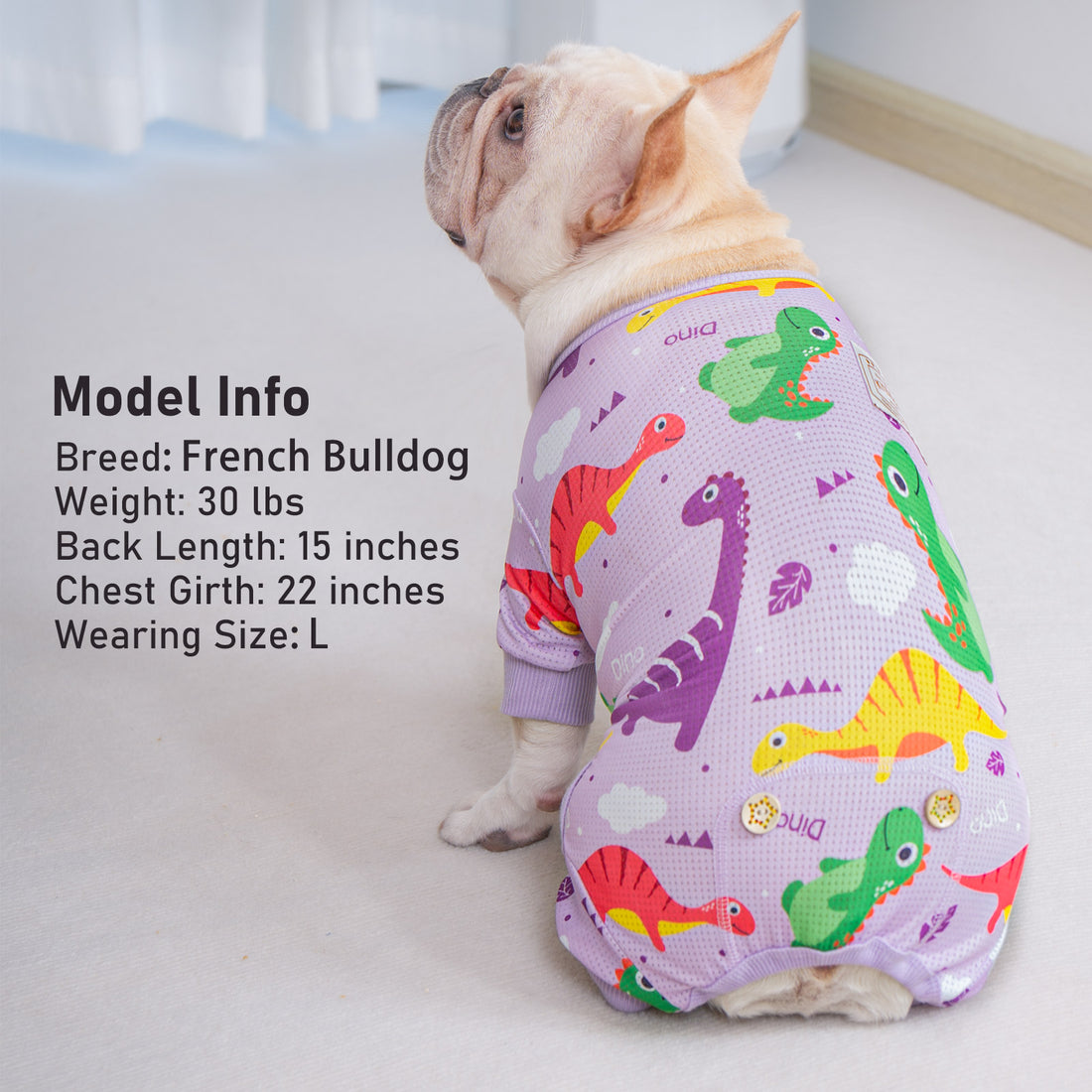 Purple dinosaur-print dog mesh onesie pajamas on a French bulldog with ribbed neck