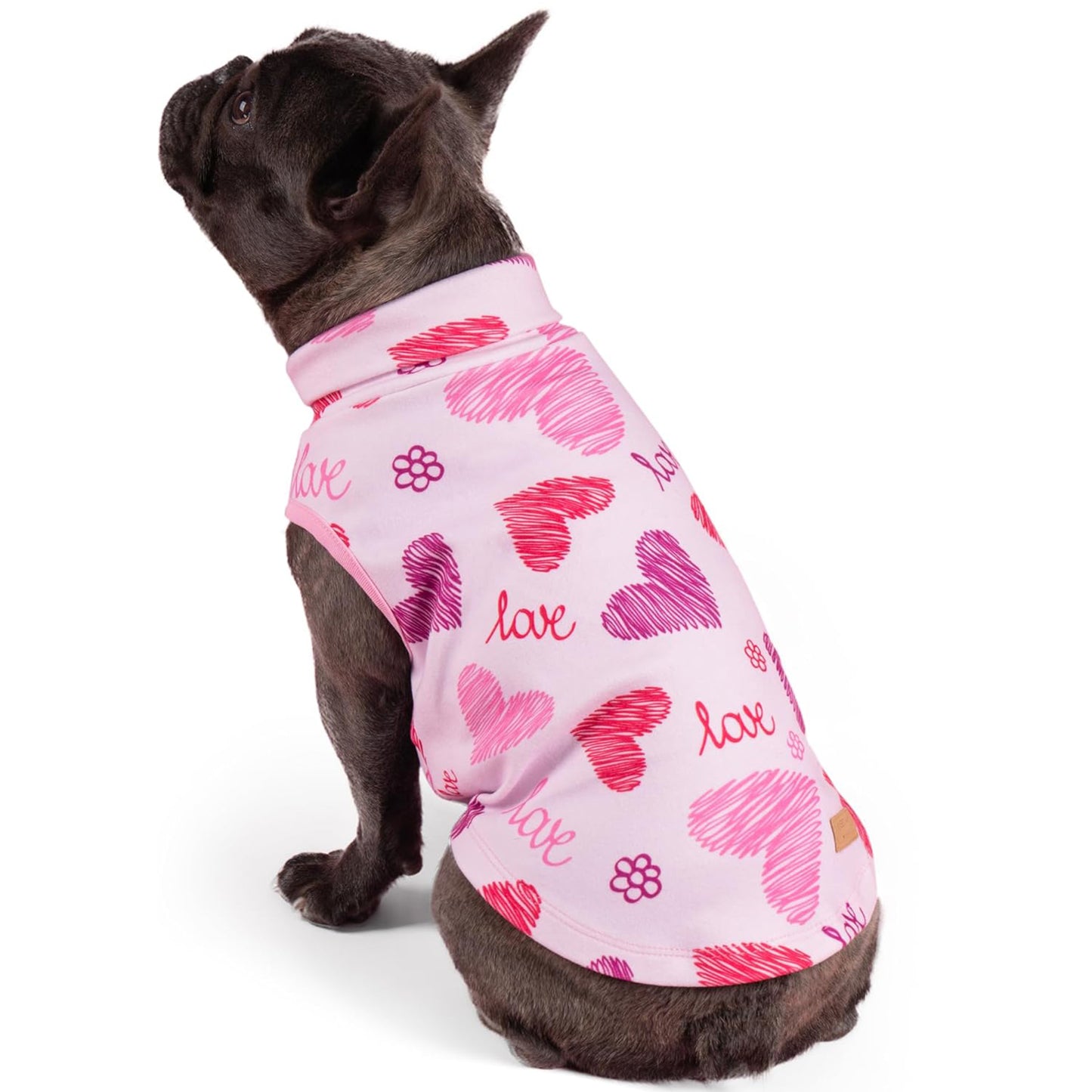 Sleeveless dog shirt in white with pink hearts, paws, and “love” text pattern