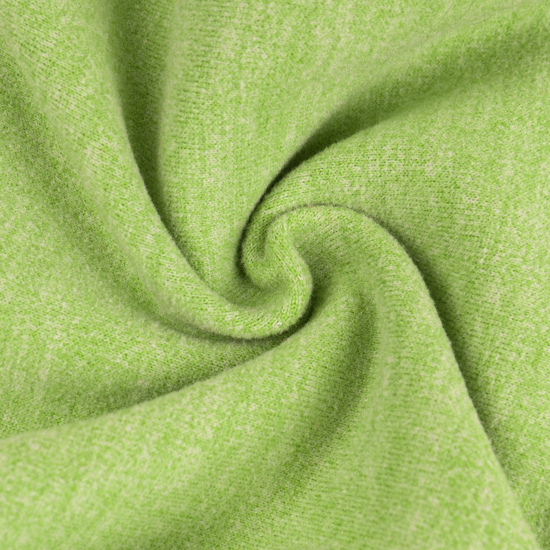 Green thermal dog pajamas fabric knit close-up with folded seam detail