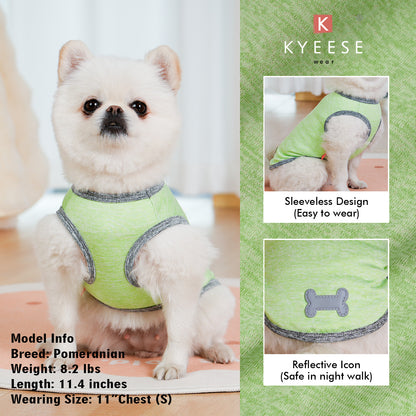Lime green sleeveless dog shirt with dark trim and reflective bone emblem