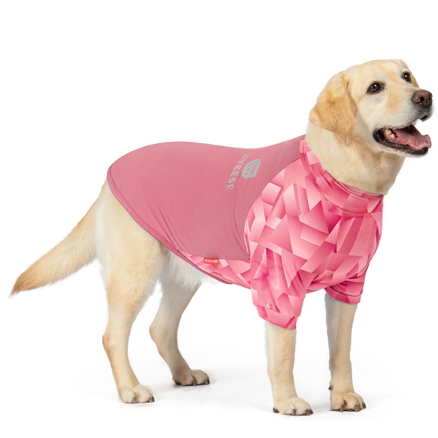 Pink UV dog shirt with geometric pattern and sleeveless fit on tan dog
