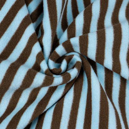 Brown-and-blue striped fleece fabric close-up with stitched swirl fold