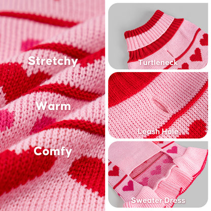 Pink knit sweater dress close-up with red heart motifs and ribbed turtleneck
